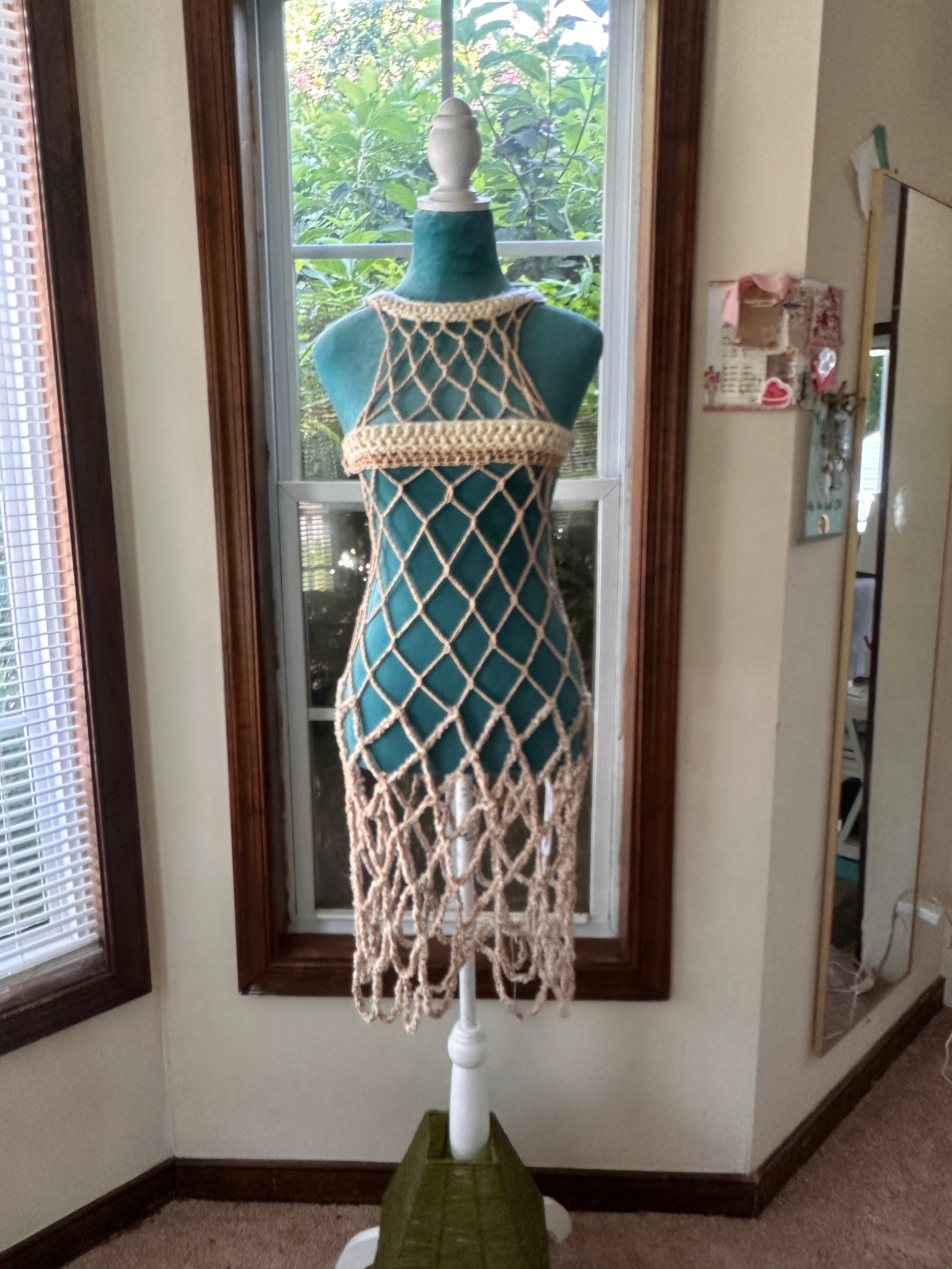 Golden knee length dress and adjustable censor strip