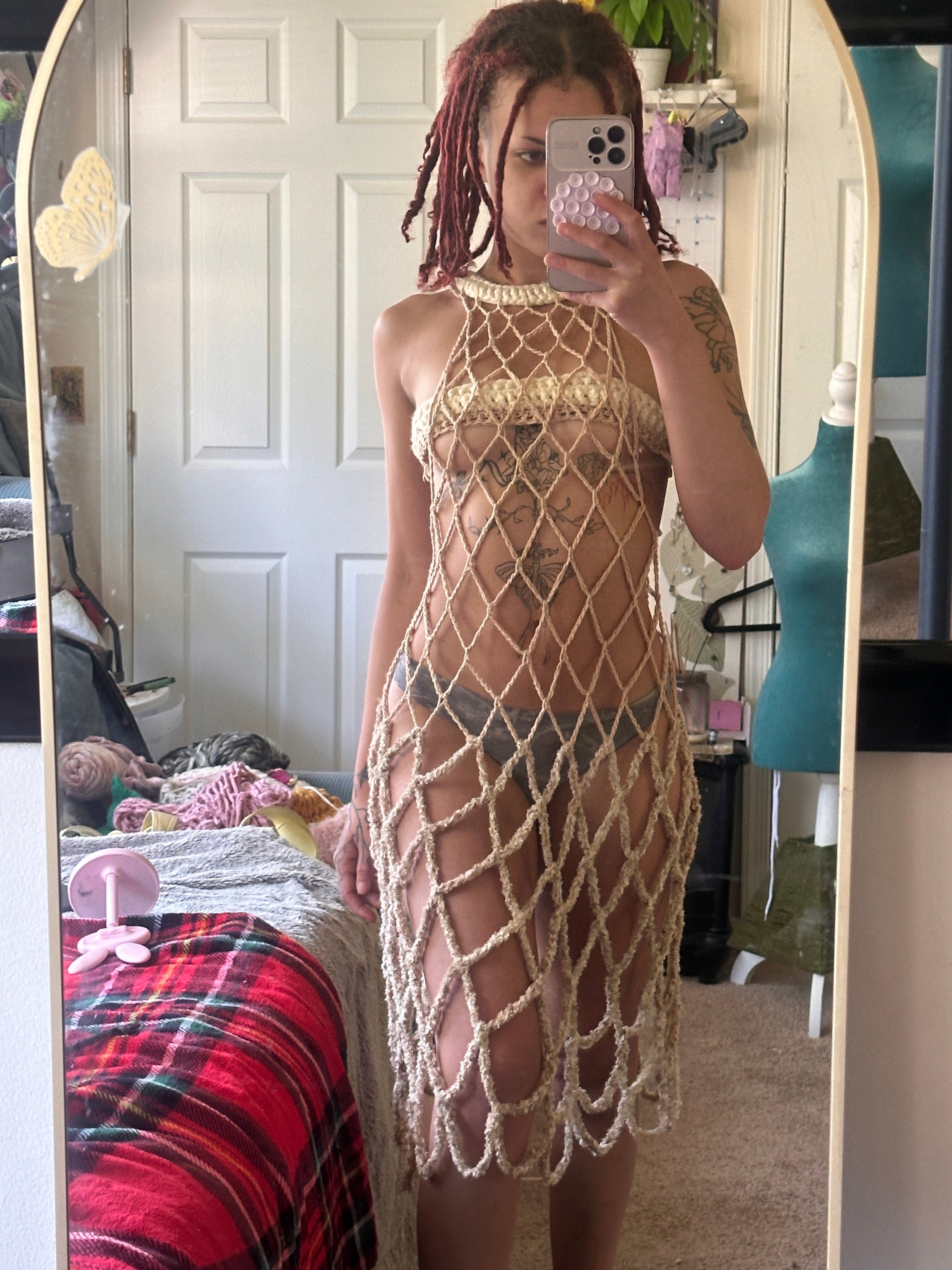 Golden knee length dress and adjustable censor strip